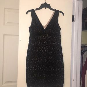 Black lace-overlay cocktail dress